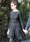 Anne Hathaway showing legs in short dress out in LA
